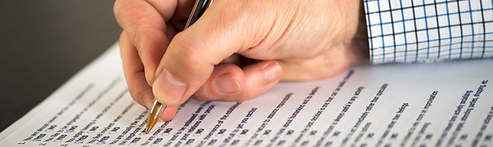 Image of a man filling out a form