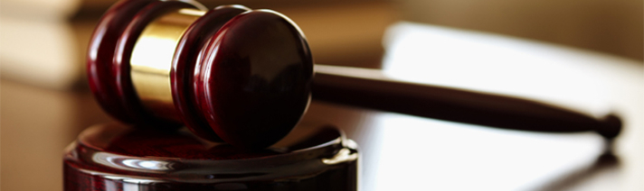 A judge's gavel on a desk