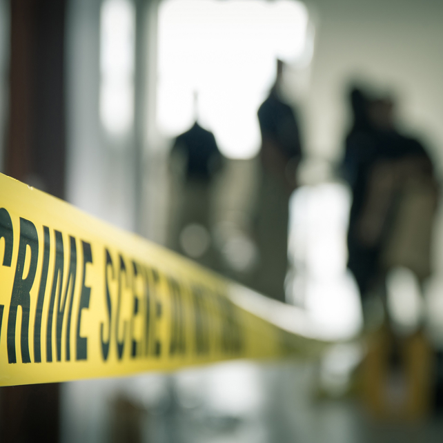 Yellow tape in front of a crime scene