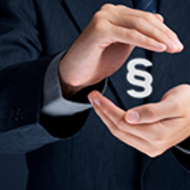 Hands holding a legal symbol