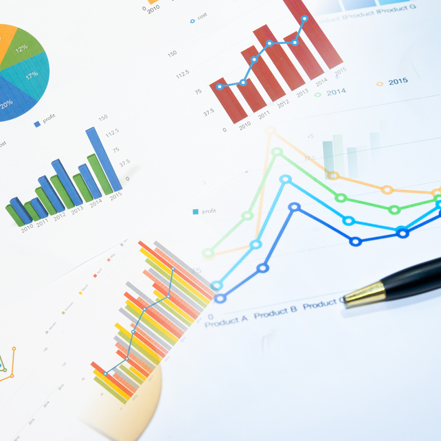 Paper with charts and graphs on them