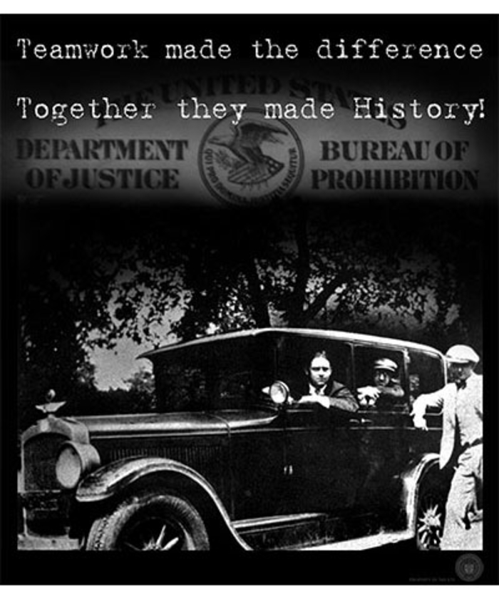 Three agents pose by a car. Caption: Teamwork made the difference. Together they made history. 