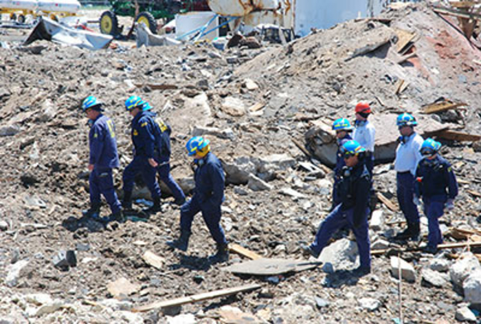 ATF Agents walking through a crime scene
