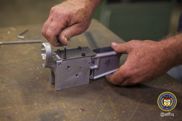 Attaching first drilling template for fire control cavity