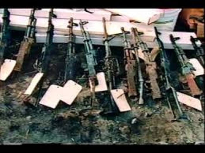 Firearms retrieved from the Mount Carmel compound and tagged as evidence.