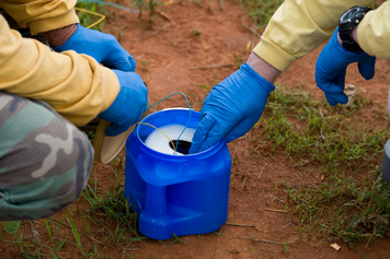 Experts examine an improvised explosive device during training
