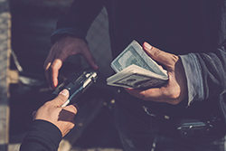 A man buying a gun illegally.