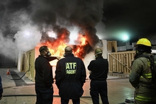 Certified Fire Investigators discussing a fire during training