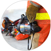 Firefighter holding a mask